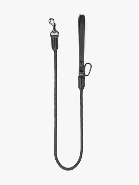 Dog leash, Floris van Bommel. Black leather dog leash with metal clips on a white background