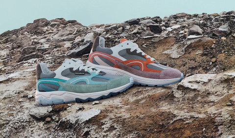 Colorful Floris van Bommel sneakers on a rocky surface